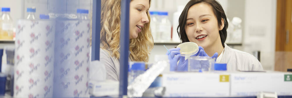 Two international students in lab